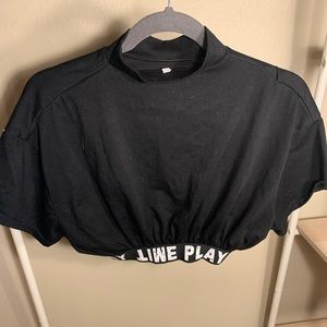 Black short sleeved turtle neck cropped